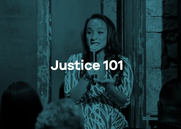 Woman with microphone, text reads "Justice 101"